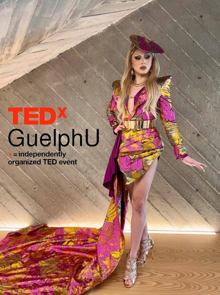 On the stage in her heels – delivering a TED Talk in full drag